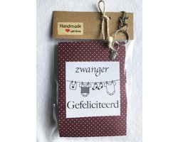 Baby kraamcadeau/ baby luiercadeau met de tekst 'zwanger gefeliciteerd' ,in verwachting, geboorte op komst jongen of meisje, luierkado, babyshower, zwangerschap, bedeltje van romper